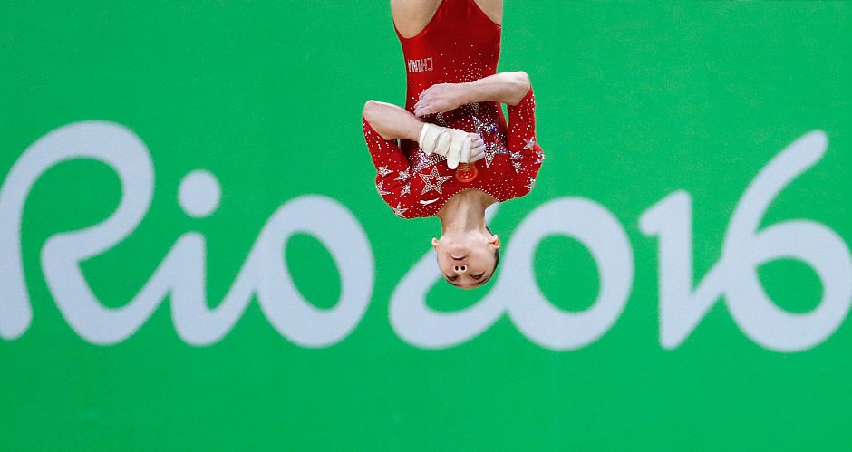 China's Fan Yilin competes in the qualifying for the women's Floor event of the Artistic Gymnastics at the Olympic Arena during the Rio 2016 Olympic Games in Rio de Janeiro on August 7, 2016. / AFP / Thomas COEX (Photo credit should read THOMAS COEX/AFP/Getty Images)