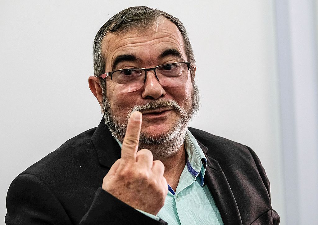 The head of the FARC guerrilla Timoleon Jimenez, aka Timochenko, gestures during a press conference in Bogota on November 25, 2016. Colombia's government and FARC rebels signed a controversial revised peace accord Thursday to end their half-century conflict, set to be ratified in Congress despite bitter opposition. / AFP / Juan Jose Horta (Photo credit should read JUAN JOSE HORTA/AFP/Getty Images)