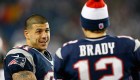 FOXBORO, MA - DECEMBER 10: Tom Brady #12 of the New England Patriots chats with Aaron Hernandez #81 against the Houston Texans at Gillette Stadium on December 10, 2012 in Foxboro, Massachusetts. (Photo by Jim Rogash/Getty Images)
