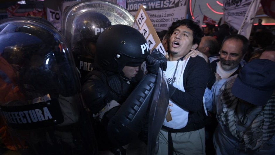 eachers clash with members of Prefectura Naval Argentina who guard the entrance of Pueyrredon bridge in Avellaneda, Buenos Aires on April 6, 2017, during a 24 hours general strike. A 24 hours general strike was called by worker's unions demanding to President Mauricio Macri's government to take measures against inflation and keep campaign promises. / AFP PHOTO / JUAN MABROMATA (Photo credit should read JUAN MABROMATA/AFP/Getty Images)