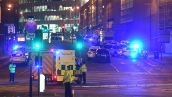 Emergency response vehicles are parked at the scene of a suspected terrorist attack during a pop concert by US star Ariana Grande in Manchester, northwest England on May 23, 2017. / AFP PHOTO / Paul ELLIS (Photo credit should read PAUL ELLIS/AFP/Getty Images)