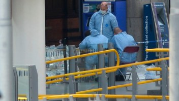 TOPSHOT - Forensics officers work at the scene at Manchester Victoria station in central Manchester, northwest England on May 23, 2017 following a deadly terror attack at a concert at the exit of the adjoining Manchester Arena the night before. Twenty two people have been killed and dozens injured in Britain's deadliest terror attack in over a decade after a suspected suicide bomber targeted fans leaving a concert of US singer Ariana Grande in Manchester. / AFP PHOTO / Ben Stansall (Photo credit should read BEN STANSALL/AFP/Getty Images)