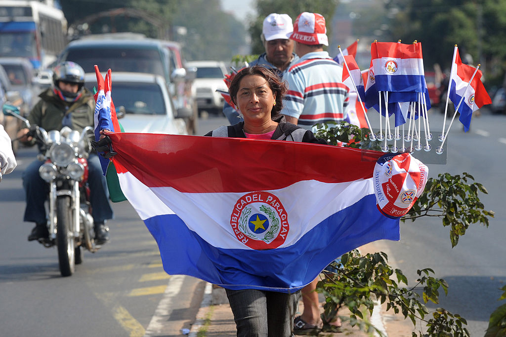 Paraguayan national flag at a street of Asuncion, Paraguay on June 10, 2010. AFP PHOTO/Norberto DUARTE (Photo credit should read NORBERTO DUARTE/AFP/Getty Images)