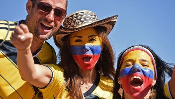 Colombian fans cheer for their team as they arrive to attend the Group C football match between Colombia and Ivory Coast at the Mane Garrincha National Stadium in Brasilia during the 2014 FIFA World Cup on June 19, 2014. AFP PHOTO / PEDRO UGARTE (Photo credit should read PEDRO UGARTE/AFP/Getty Images)