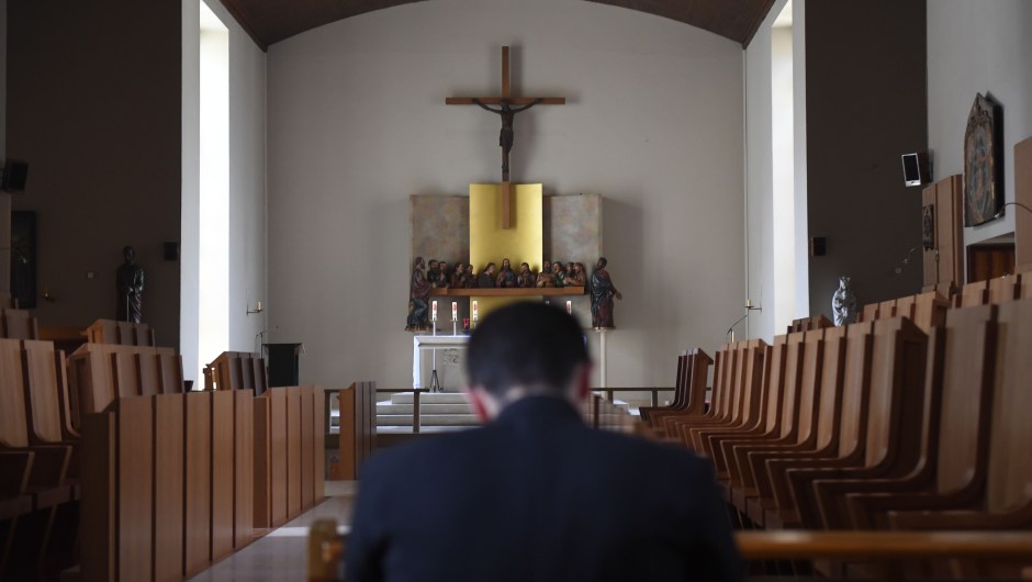A seminarian from the Saint Martin community communes with himself in a chapel at the Abbey of Evron, on June 22, 2017. The Saint Martin Community based in the biggest seminar in France provides priests and secular deacons living their apostolate together in increasingly numerous dioceses. / AFP PHOTO / DAMIEN MEYER (Photo credit should read DAMIEN MEYER/AFP/Getty Images)
