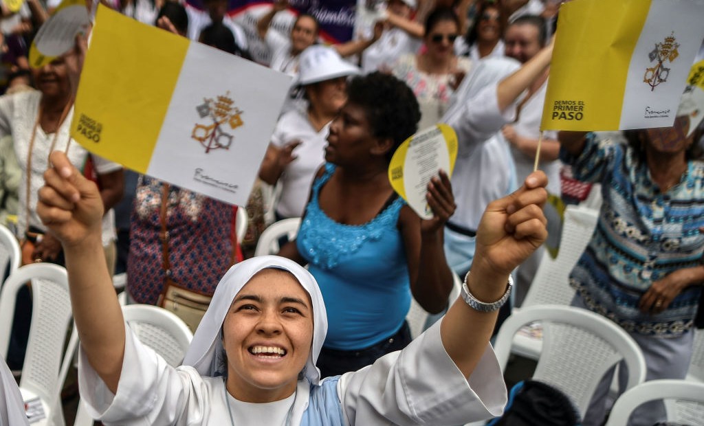 A nun smiles during a Mass ahead of Pope Francis' visit to Colombia, in Cali on September 2, 2017. Pope Francis will make a special four-day visit to Colombia, from September 6 to 11, to add his weight to the process of reconciliation between the government and the FARC. / AFP PHOTO / LUIS ROBAYO (Photo credit should read LUIS ROBAYO/AFP/Getty Images)