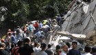 People remove debris of a collapsed building looking for possible victims after a quake rattled Mexico City on September 19, 2017. A powerful earthquake shook Mexico City on Tuesday, causing panic among the megalopolis' 20 million inhabitants on the 32nd anniversary of a devastating 1985 quake. The US Geological Survey put the quake's magnitude at 7.1 while Mexico's Seismological Institute said it measured 6.8 on its scale. The institute said the quake's epicenter was seven kilometers west of Chiautla de Tapia, in the neighboring state of Puebla. / AFP PHOTO / Omar TORRES (Photo credit should read OMAR TORRES/AFP/Getty Images)