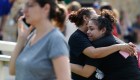 Santa Fe High School junior Guadalupe Sanchez, 16, cries in the arms of her mother, Elida Sanchez, after reuniting with her at a meeting point at a nearby Alamo Gym fitness center following a shooting at Santa Fe High School in Santa Fe, Texas, on Friday, May 18, 2018. (Michael Ciaglo/Houston Chronicle via AP)