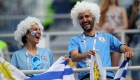 Animadores de Uruguay disfrutan del ambiente previo al encuentro contra Francia. (Crédito: Alexander Hassenstein/Getty Images)