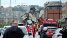 TOPSHOT - A picture taken on August 14, 2018 in Genoa shows a section of a giant motorway bridge that collapsed earlier injuring several people. - Rescuers scouring through the wreckage after part of a viaduct of the A10 freeway collapsed said there were "tens of victims", while images from the scene showed an entire carriageway plunged on to railway lines below. (Photo by ANDREA LEONI / AFP) (Photo credit should read ANDREA LEONI/AFP/Getty Images)
