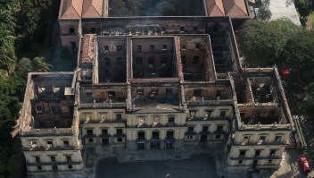 RIO DE JANEIRO, BRAZIL - SEPTEMBER 03: Aerial view of the damage to the National Museum of Brazil after a devastating fire on September 3, 2018 in Rio de Janeiro, Brazil. A cause to the catastrophic fire is still unknown. The museum, which is tied to the Rio de Janeiro federal university and the Education Ministry, was founded in 1818 by King John VI of Portugal and celebrated its 200th anniversary this year. It houses several landmark collections including Egyptian artifacts and the oldest human fossil found in Brazil. Its collection include more than 20 million items ranging from archaeological findings to historical memorabilia. (Photo by Buda Mendes/Getty Images)