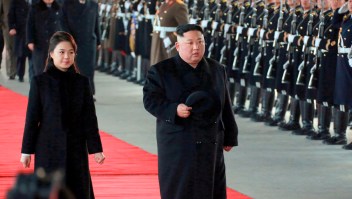 In this Monday, Jan. 7, 2019, photo provided on Tuesday, Jan. 8, 2019 by the North Korean government, North Korean leader Kim Jong Un walks with his wife Ri Sol Ju at Pyongyang Station in Pyongyang, North Korea, before leaving for China. Kim left for China for a four-day trip, the North's state media reported Tuesday, amid speculation that he may attempt to coordinate his positions with Beijing ahead of his likely summit with U.S. President Donald Trump. Independent journalists were not given access to cover the event depicted in this image distributed by the North Korean government. The content of this image is as provided and cannot be independently verified. Korean language watermark on image as provided by source reads: "KCNA" which is the abbreviation for Korean Central News Agency. (Korean Central News Agency/Korea News Service via AP)