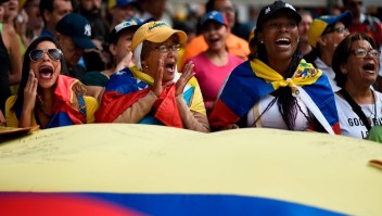 TOPSHOT - Supporters of Venezuelan opposition leader and self declared acting president Juan Guaido, cheer as they start gathering for a rally to press the military to let in US humanitarian aid, in eastern Caracas on February 12, 2019. - The tug of war between the government and opposition is centred on whether humanitarian aid will be allowed into the economically crippled country, which suffers shortages of food, medicine and other basics. (Photo by Federico PARRA / AFP) (Photo credit should read FEDERICO PARRA/AFP/Getty Images)