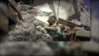 Muere niña captada salvando a su hermanita en Siria