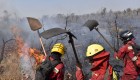 Firefighters try to control a fire near Charagua, Bolivia, in the border with Paraguay, south of the Amazon basin, on August 29, 2019. - Fires have destroyed 1.2 million hectares of forest and grasslands in Bolivia this year, the government said on Wednesday, although environmentalists claim the true figure is much greater. The news comes after leftist President Evo Morales suspended his re-election campaign on Monday to direct the government's response to a growing environmental disaster in the Bolivian portion of the Amazon rainforest, where wildfires have been raging since May. (Photo by AIZAR RALDES / AFP) (Photo credit should read AIZAR RALDES/AFP/Getty Images)