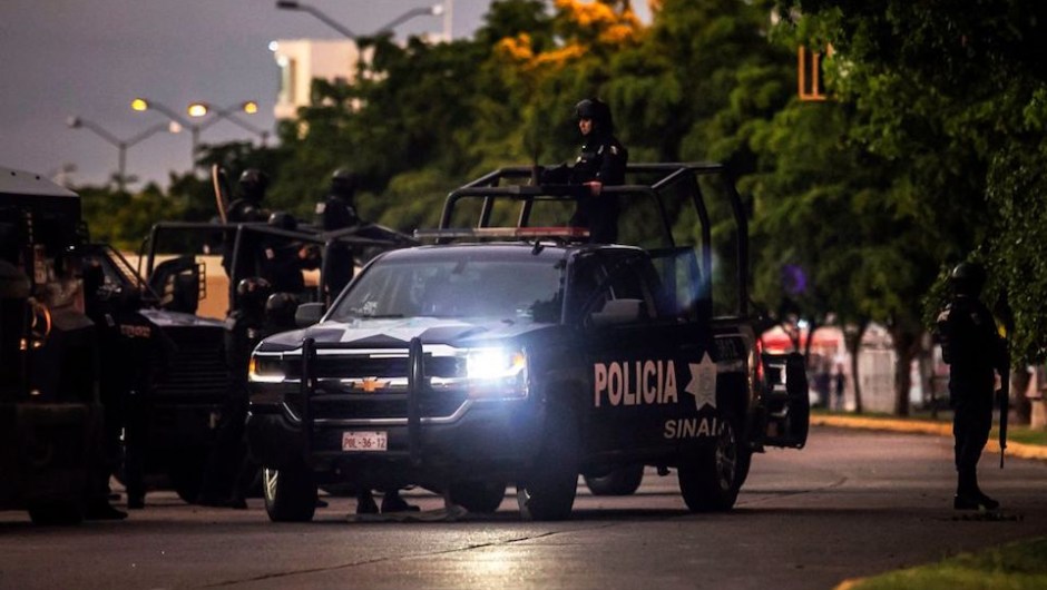 EDITORS NOTE: Graphic content / Mexican police patrol in a street of Culiacan, state of Sinaloa, Mexico, on October 17, 2019, after heavily armed gunmen in four-by-four trucks fought an intense battle with Mexican security forces. - Mexican security forces on Thursday arrested one son of jailed drug kingpin Joaquin "El Chapo" Guzman in an operation that triggered fighting in the western city of Culiacan, Security Minister Alfonso Durazo said. (Photo by RASHIDE FRIAS / AFP) (Photo by RASHIDE FRIAS/AFP via Getty Images)