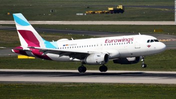 An aircraft of German Eurowings airline lands with seasonal workers from Romania at the airport in Duesseldorf, western Germany, on April 9, 2020 during the exit restrictions amid the new coronavirus / Covid-19 pandemic. - The federal government has agreed to fly in 80,000 foreign seasonal workers to Germany under strict conditions. The helpers are urgently needed for the asparagus harvest, among other things. Today, the first flights are scheduled to land at the airport in Duesseldorf as well as in Berlin-Schoenefeld. (Photo by INA FASSBENDER / AFP) (Photo by INA FASSBENDER/AFP via Getty Images)